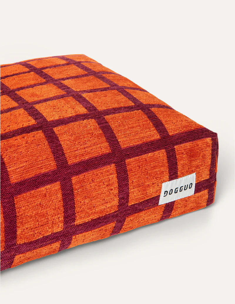 orange and burgundy checkered basket