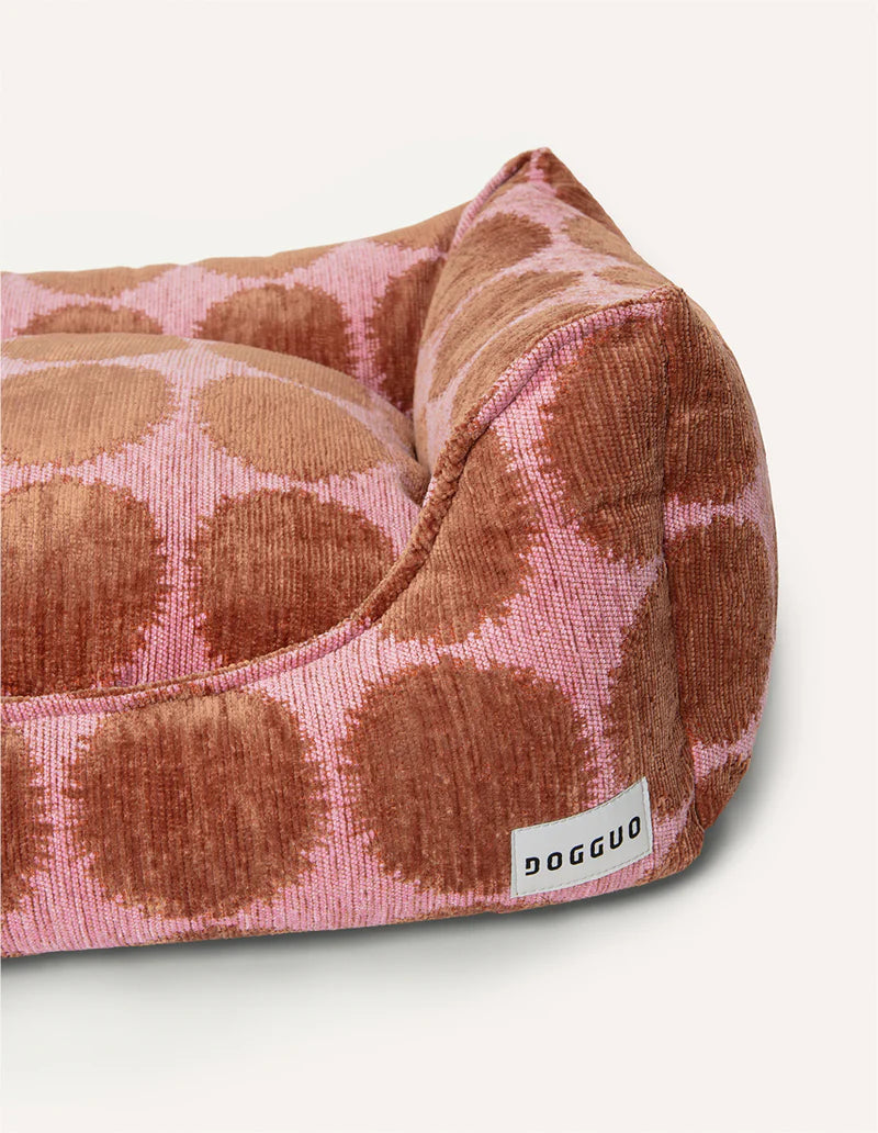 Pink basket with brown polka dots