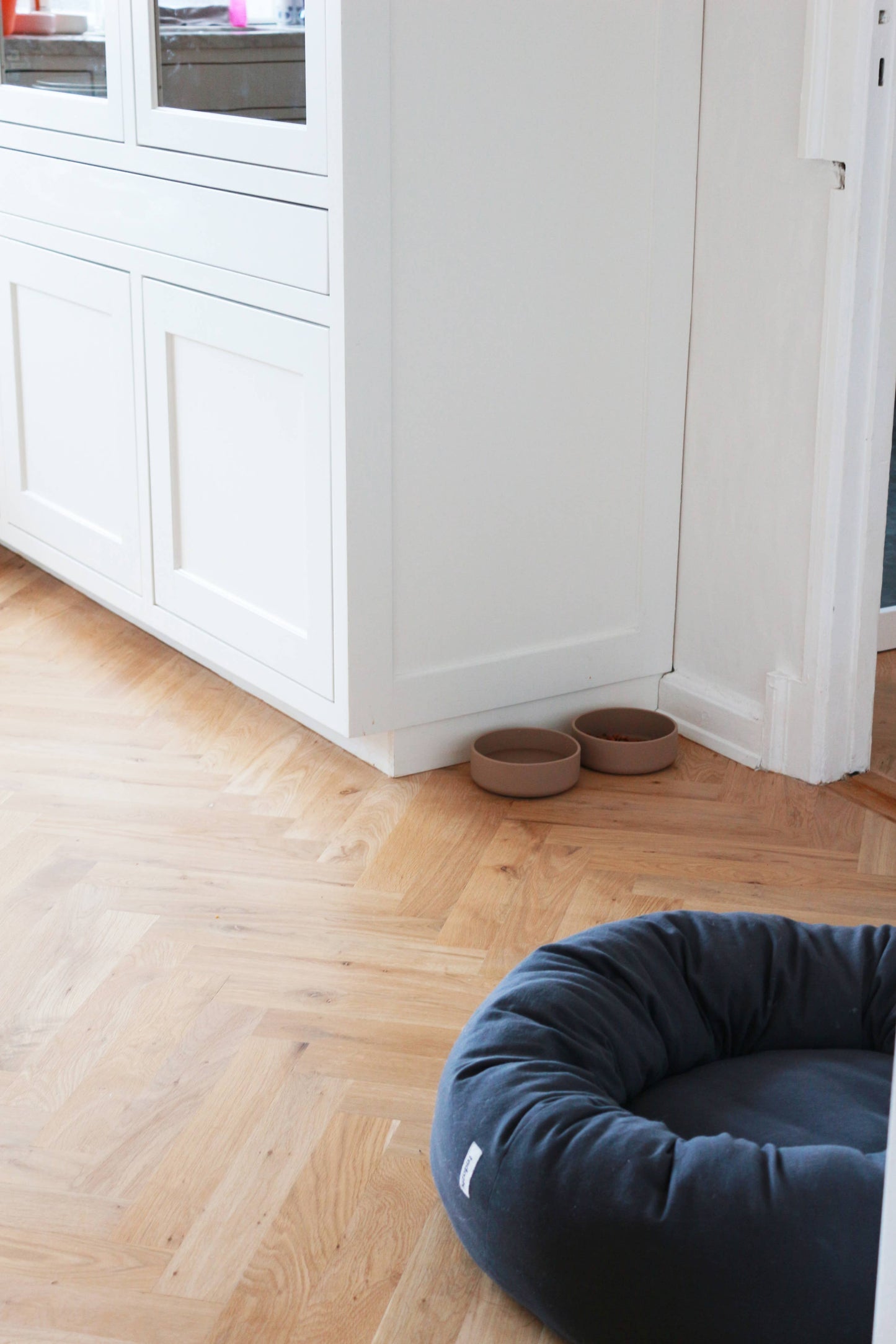 Beige dog bowl