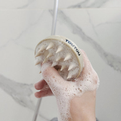 Brosse en silicone pour la douche