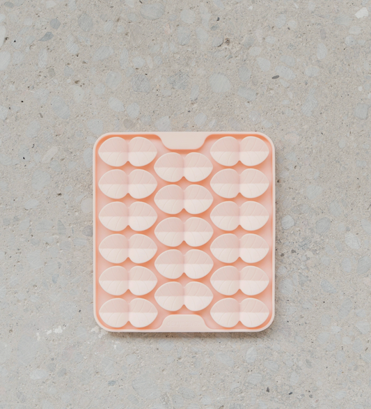 Tapis de léchage rose clair