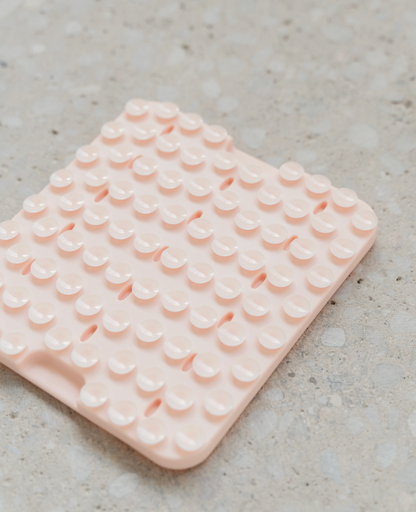 Tapis de léchage rose clair