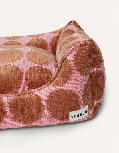 Pink basket with brown polka dots