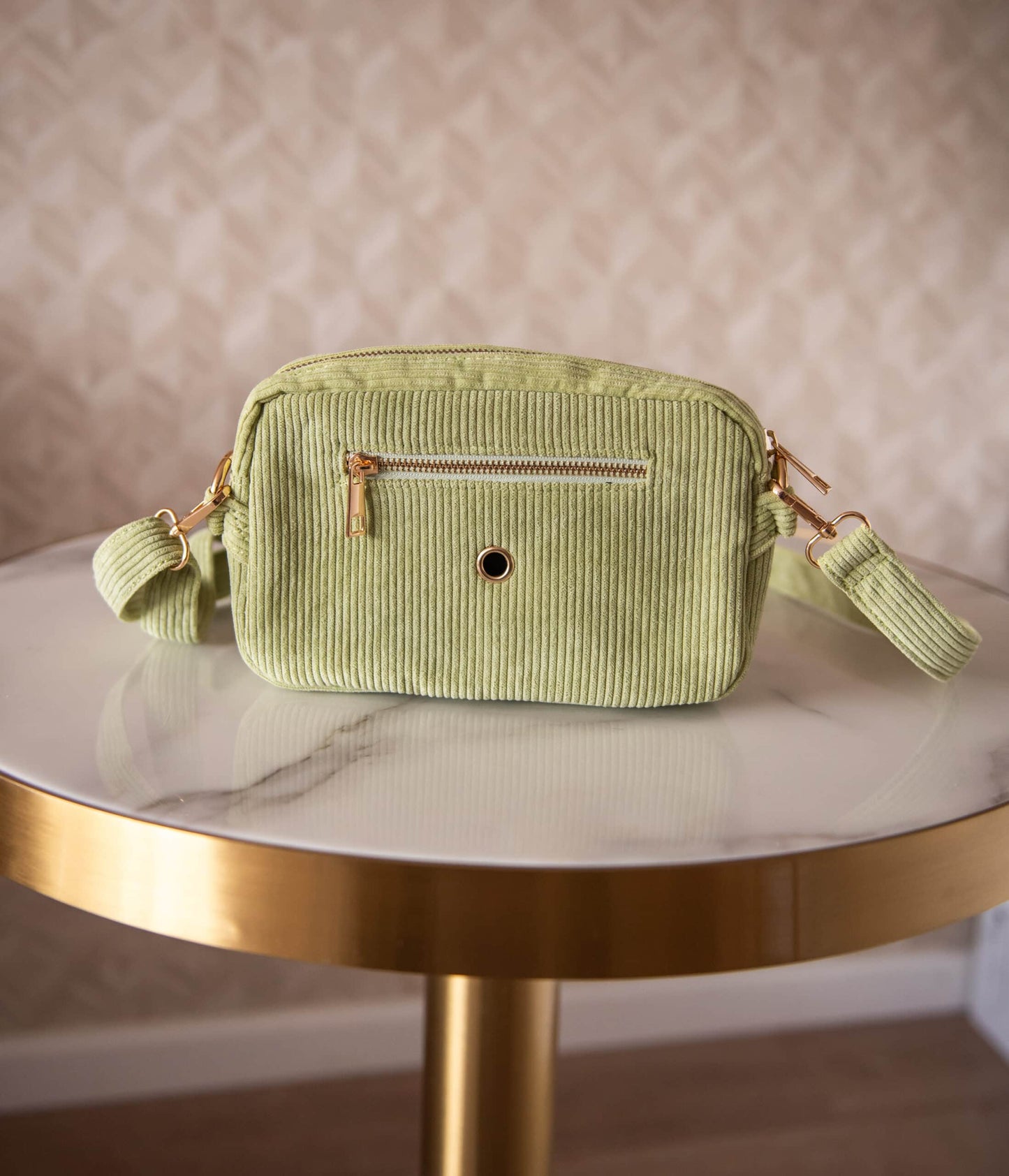 Green corduroy duffle bag